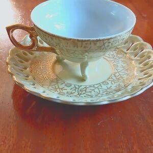 Decorative cup and saucer